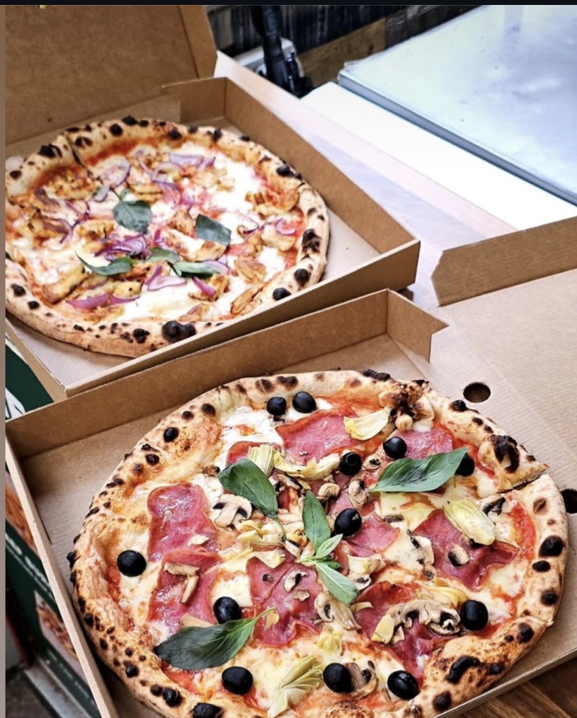 Fresh pizzas boxed up at the Norwich Market stall